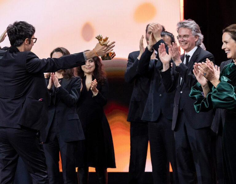 People celebrating on stage