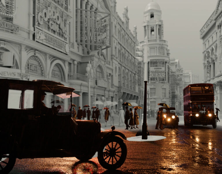 A black and white city street scene with vintage cars, a double-decker bus, and people holding umbrellas. Tall buildings with bright signs line the wet, reflective road, evoking a 1930s era urban atmosphere reminiscent of Downton Abbey.