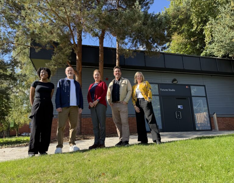 Destiny Lawrence, Peter Richardson, Jodi Nelson-Tabor (Final Pixel), Michael McKenna (Final Pixel) and Amanda Murphy stood outside a building