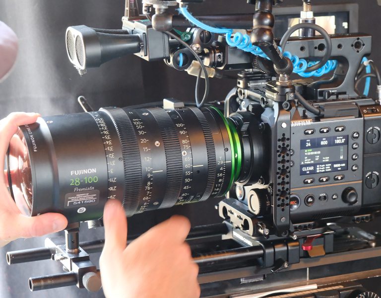 A person using the FUJIFILM GFX ETERNA 55