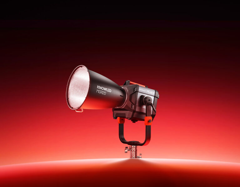 A Godox light against a red background