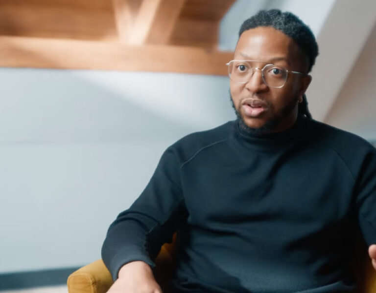 Jomo Fray sat in a chair