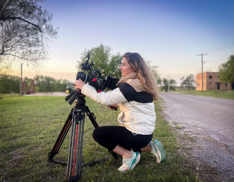 Kathryn Boyd-Batstone behind a camera