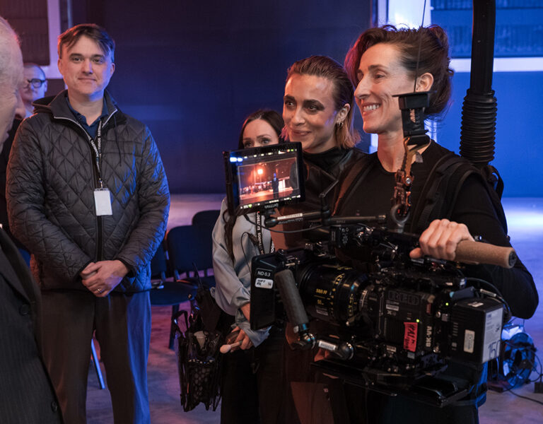 King Charles talking to a group of people