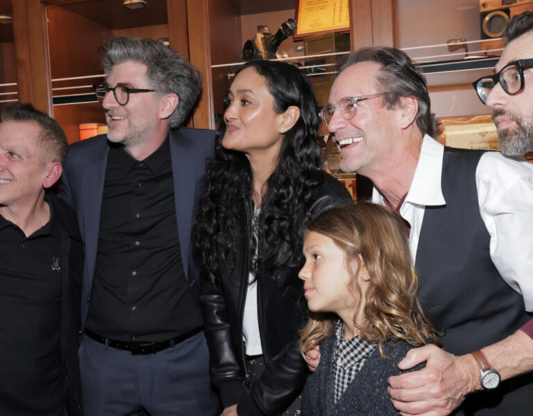 A group of people pose for a photo together