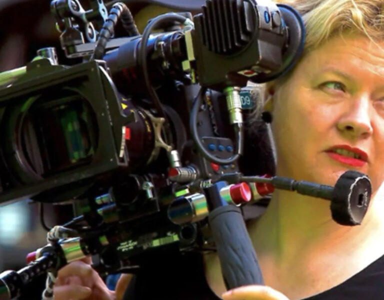 Mandy Walker with a camera on her shoulder