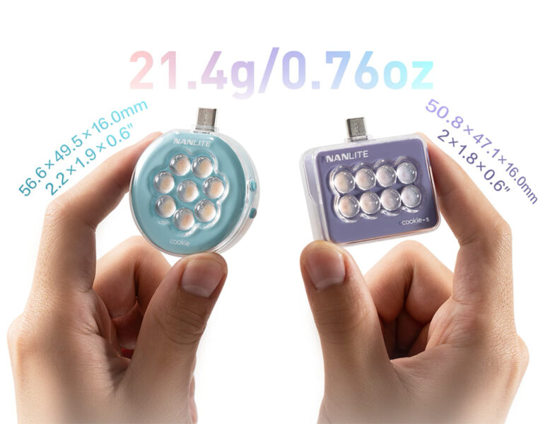 A person holding the cookie and cookie-s