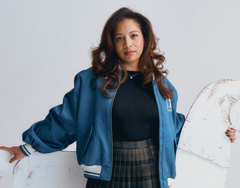 Nathalie Pitters leaning on a white horse