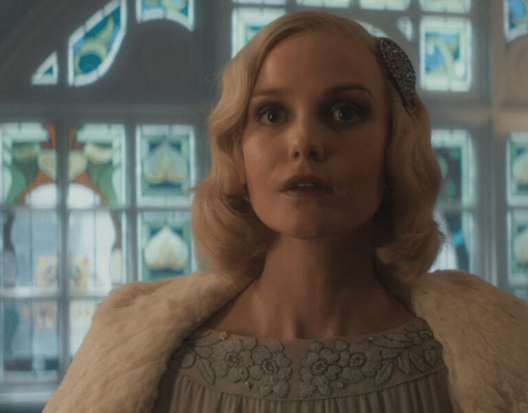 A woman in formal attire