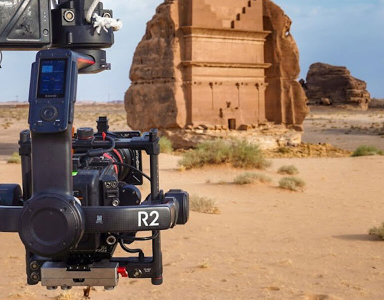 A camera pointing at a desert landscape